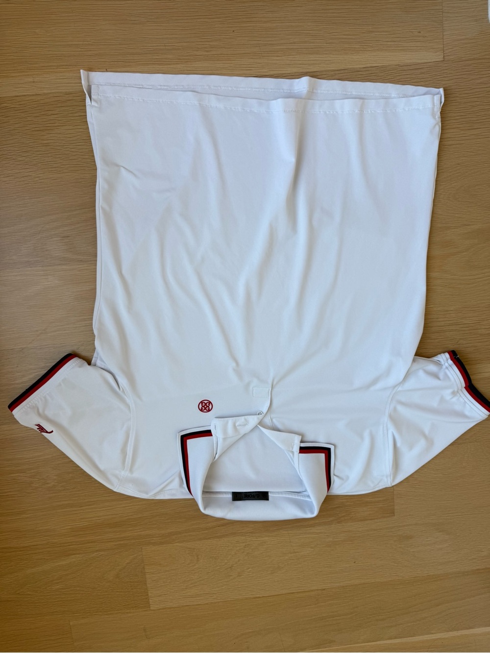 G/FORE White Polo with Red and Black Trim